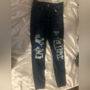 ripped jeans with patches dark wash